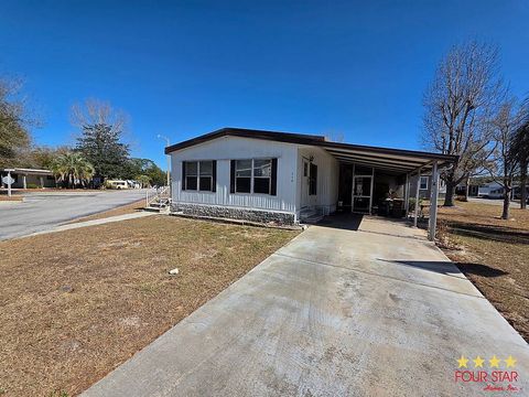 Photo of 3150 NE 36th Ave #518, Ocala, FL 34479 (MLS # 11662148)