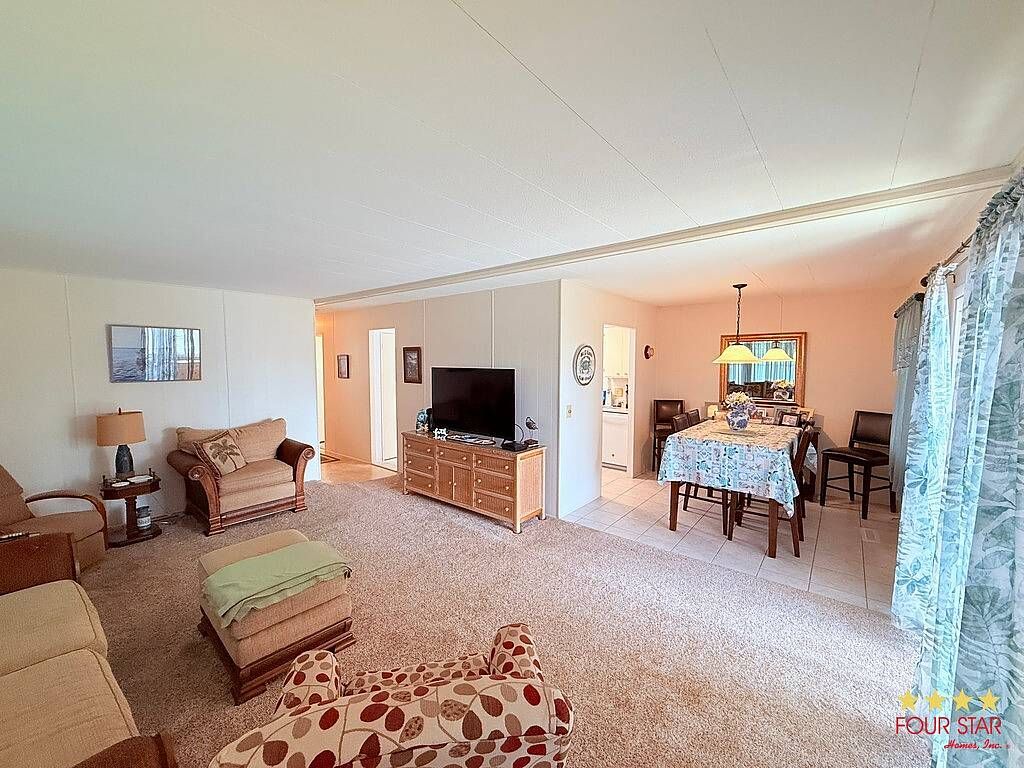 Photo of 1284 Willliamsburg Pl, Daytona Beach, FL 32119 (MLS # 11623318)