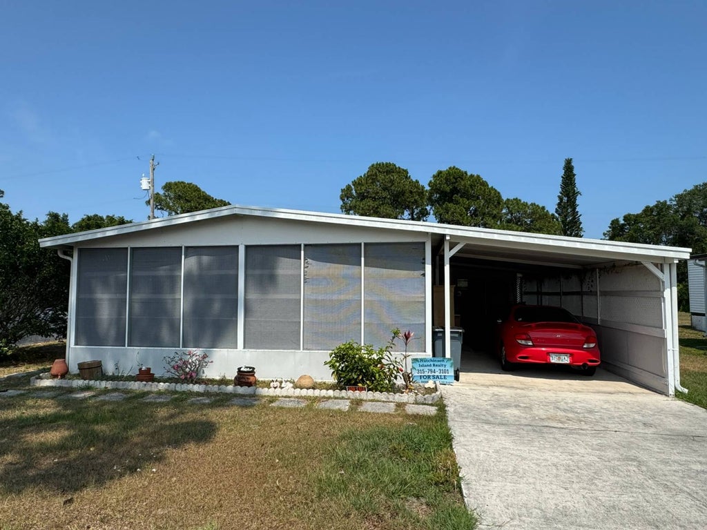 Photo of 420 E. Erie Dr, Fort Pierce, FL 34946 (MLS # 11850444)