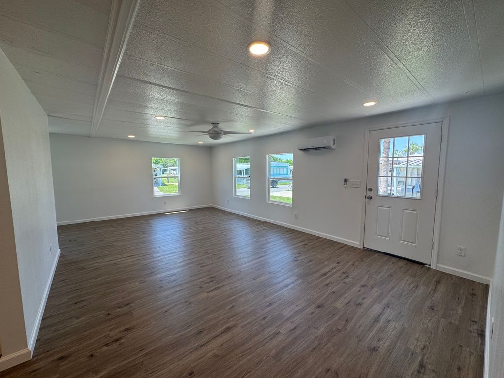 Photo of 124 Whippoorwill Dr, New Smyrna Beach, FL 32168 (MLS # 11775972)
