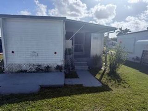 Photo of 2424 Cheri Lane, Hallandale Beach, FL 33009 (MLS # 11692602)