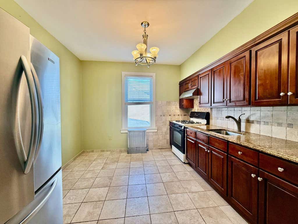 Photo of 9512 108th Ave #2, Ozone Park, NY 11417 (MLS # 11924872)