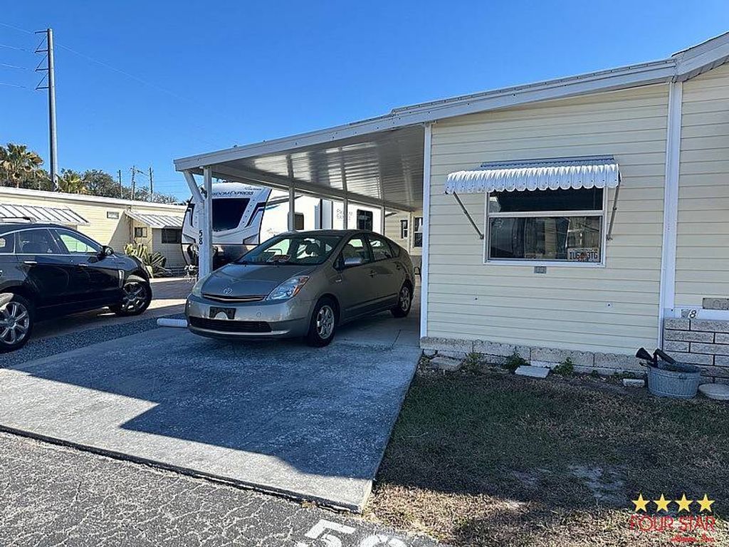 Photo of 39146 Otis Allen Rd #58, Zephyrhills, FL 33540 (MLS # 11650742)