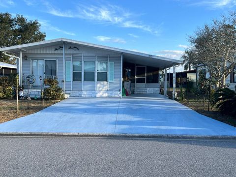 Photo of 903 Dogwood Dr, Barefoot Bay, FL 32976 (MLS # 11675061)