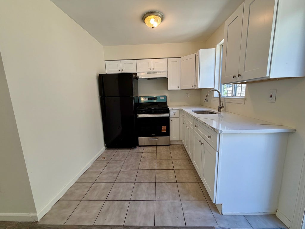 Photo of 43 Benziger Avenue, Staten Island, NY 10301 (MLS # 11824712)