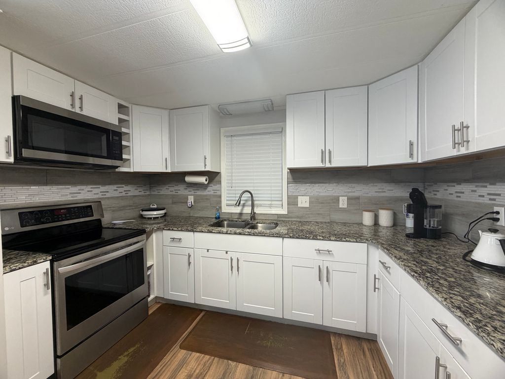 Photo of 581 Falcon Ave, Lakeland, FL 33815 (MLS # 11680364)