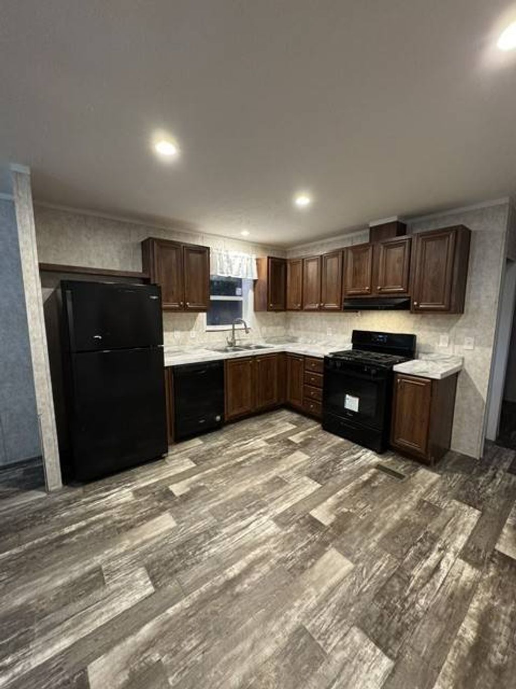 Photo of 55 Saratoga Greens Mobile Home Park, Greenfield Center, NY 12833 (MLS # 11747185)