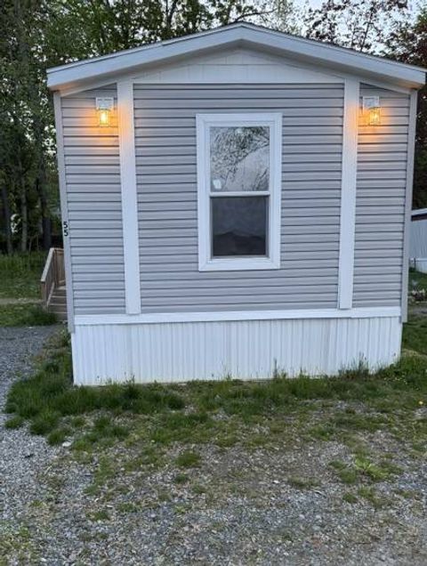 Photo of 55 Saratoga Greens Mobile Home Park, Greenfield Center, NY 12833 (MLS # 11747185)