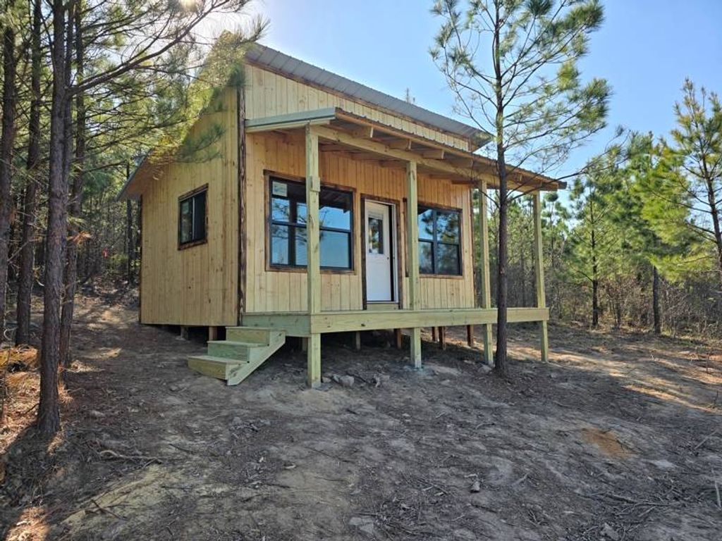 Photo of 7 TBD Poteau Mtn Cabin, Heavener, OK 74937 (MLS # 11680565)