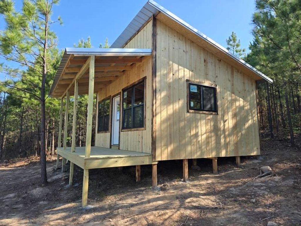 Photo of 7 TBD Poteau Mtn Cabin, Heavener, OK 74937 (MLS # 11680565)
