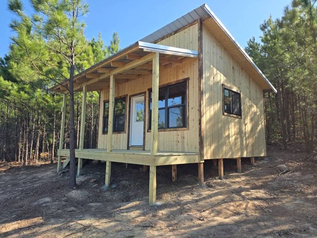 Photo of 7 TBD Poteau Mtn Cabin, Heavener, OK 74937 (MLS # 11680565)