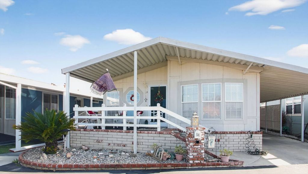 Photo of 16222 Monterey Lane #84, Huntington Beach, CA 92649 (MLS # 11618950)