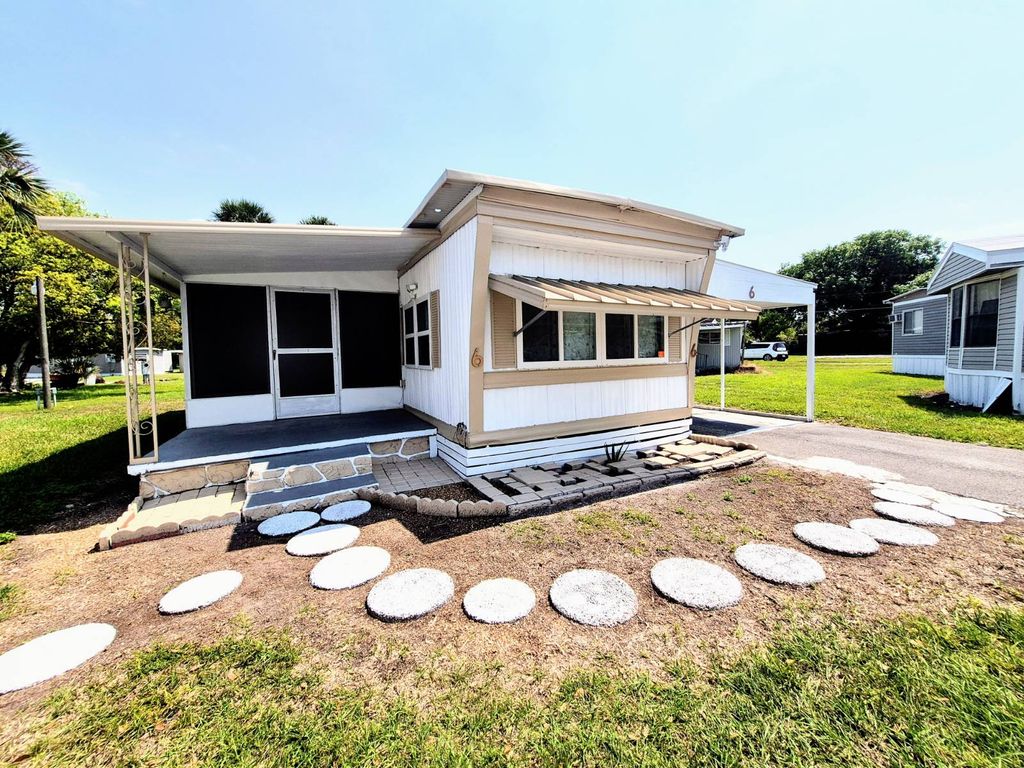 Photo of 325 Rosedale Ave #6, Saint Cloud, FL 34769 (MLS # 11681134)