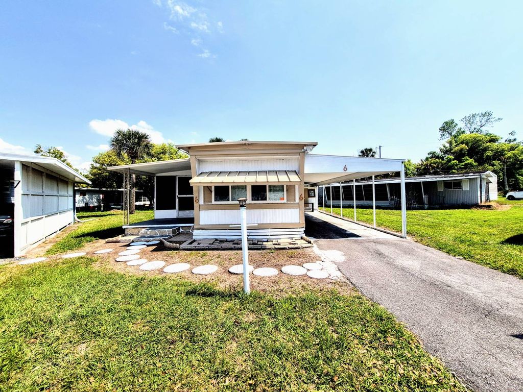 Photo of 325 Rosedale Ave #6, Saint Cloud, FL 34769 (MLS # 11681134)