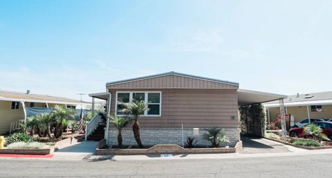 Photo of 18601 Newland St #59, Huntington Beach, CA 92646 (MLS # 11729146)