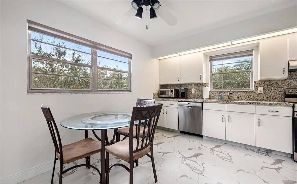 Photo of 1501 Cayman Way, Coconut Creek, FL 33066 (MLS # 11677877)