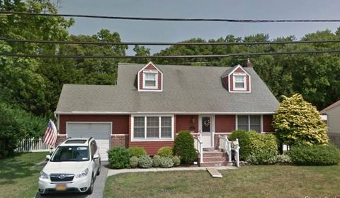 Photo of 57 Birchbrook Dr, Smithtown, NY 11787 (MLS # 11658752)