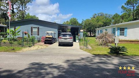 Photo of 11 Audubon Way, Flagler Beach, FL 32136 (MLS # 11737865)