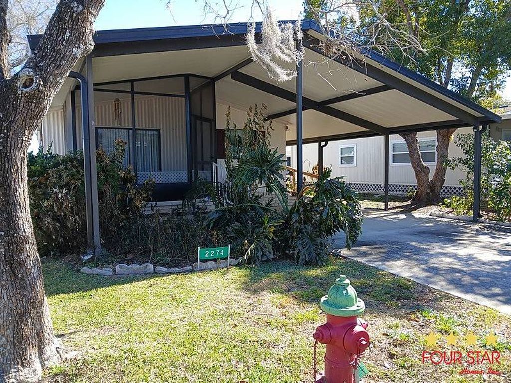 Photo of 2274 Pebble Beach Blvd, Orlando, FL 32826 (MLS # 11650844)