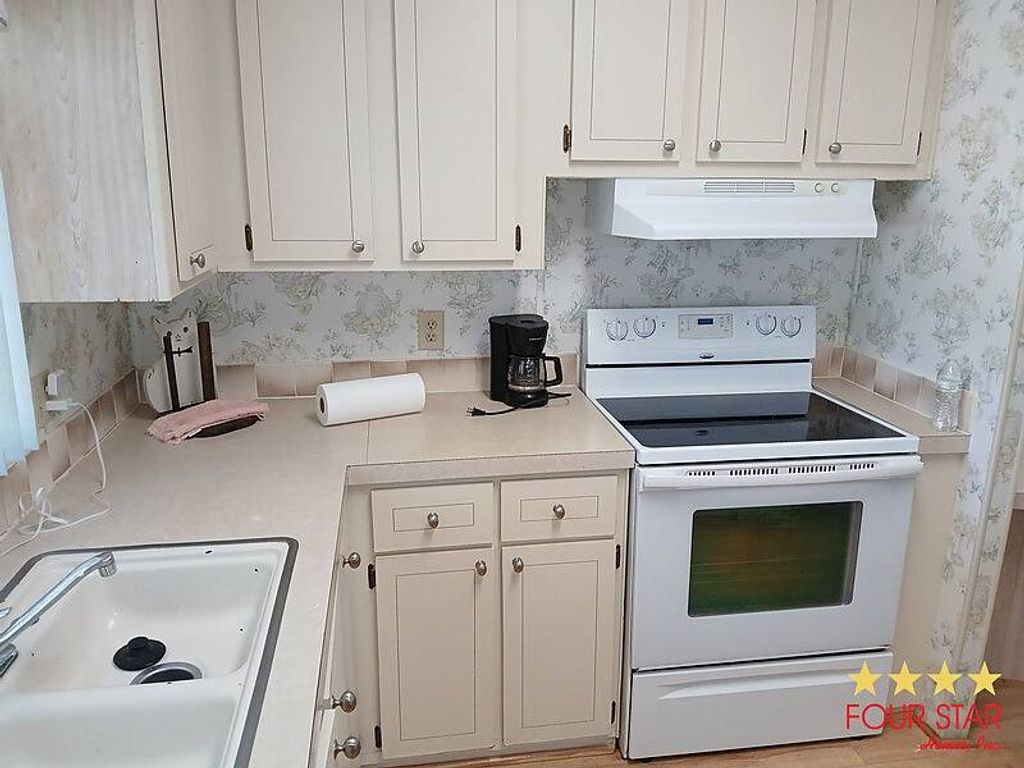 Photo of 2274 Pebble Beach Blvd, Orlando, FL 32826 (MLS # 11650844)