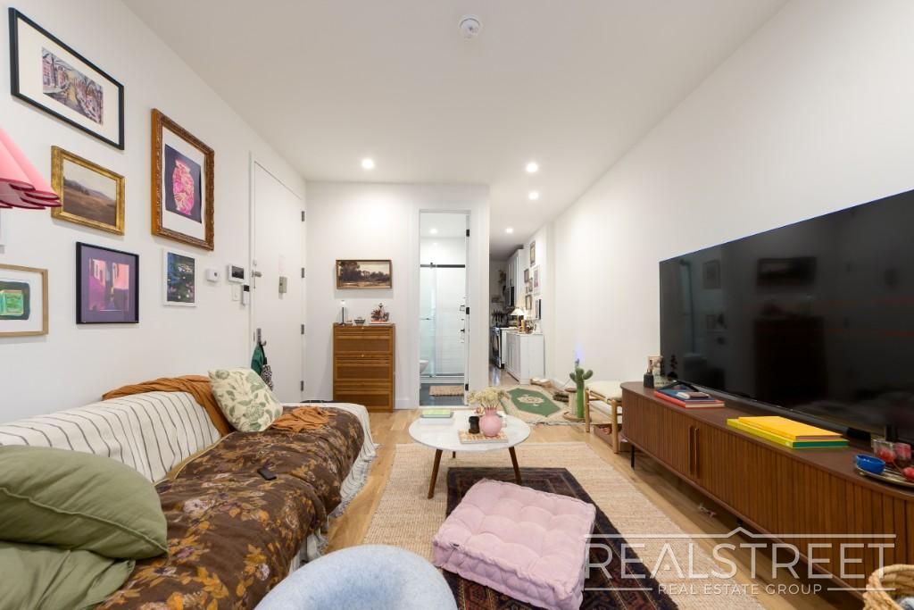 Photo of 206 MacDougal St #1, BROOKLYN, NY 11233 (MLS # 11738399)