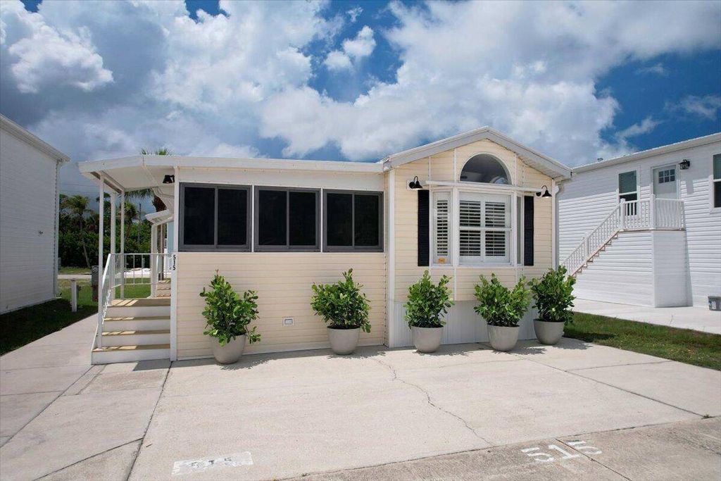 Photo of 515 Tropico Ln, Fort Myers, FL 33908 (MLS # 11652283)