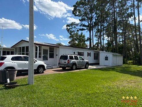 Photo of 68 Regency Dr, Port Orange, FL 32129 (MLS # 11852291)
