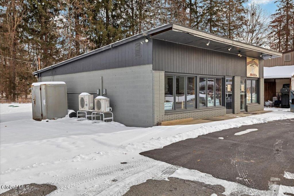 Photo of 98 Lake Avenue, Lake Luzerne, NY 12846 (MLS # 11618448)