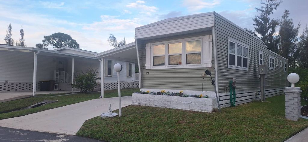 Photo of 701 Aqui Esta Drive #107 Dr, Punta Gorda, FL 33950 (MLS # 11685680)