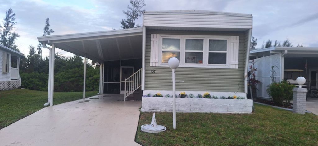 Photo of 701 Aqui Esta Drive #107 Dr, Punta Gorda, FL 33950 (MLS # 11685680)