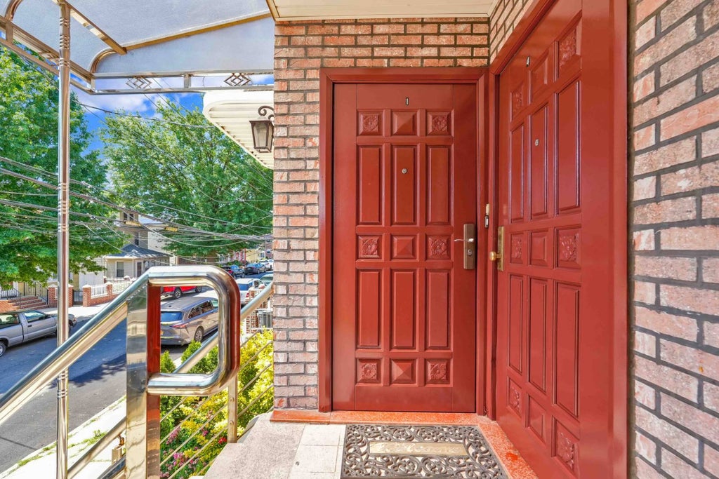 Photo of 8433 60 Drive, Middle Village, NY 11379 (MLS # 11848867)