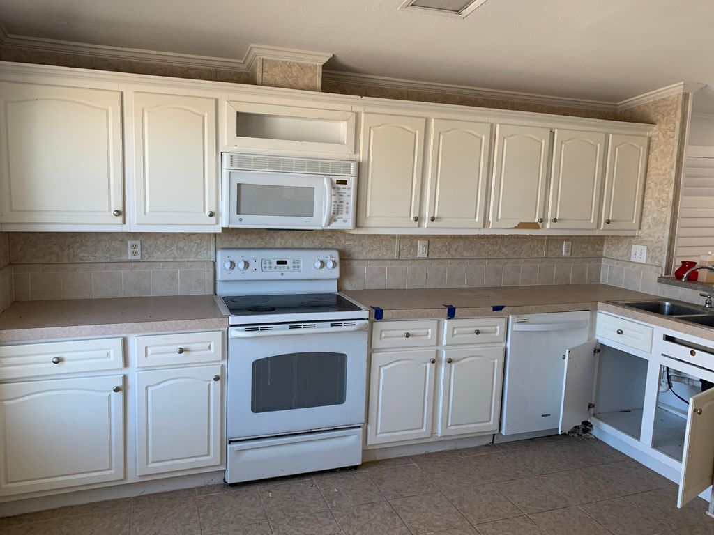 Photo of 58 Pelican Dr, New Smyrna Beach, FL 32168 (MLS # 11653911)