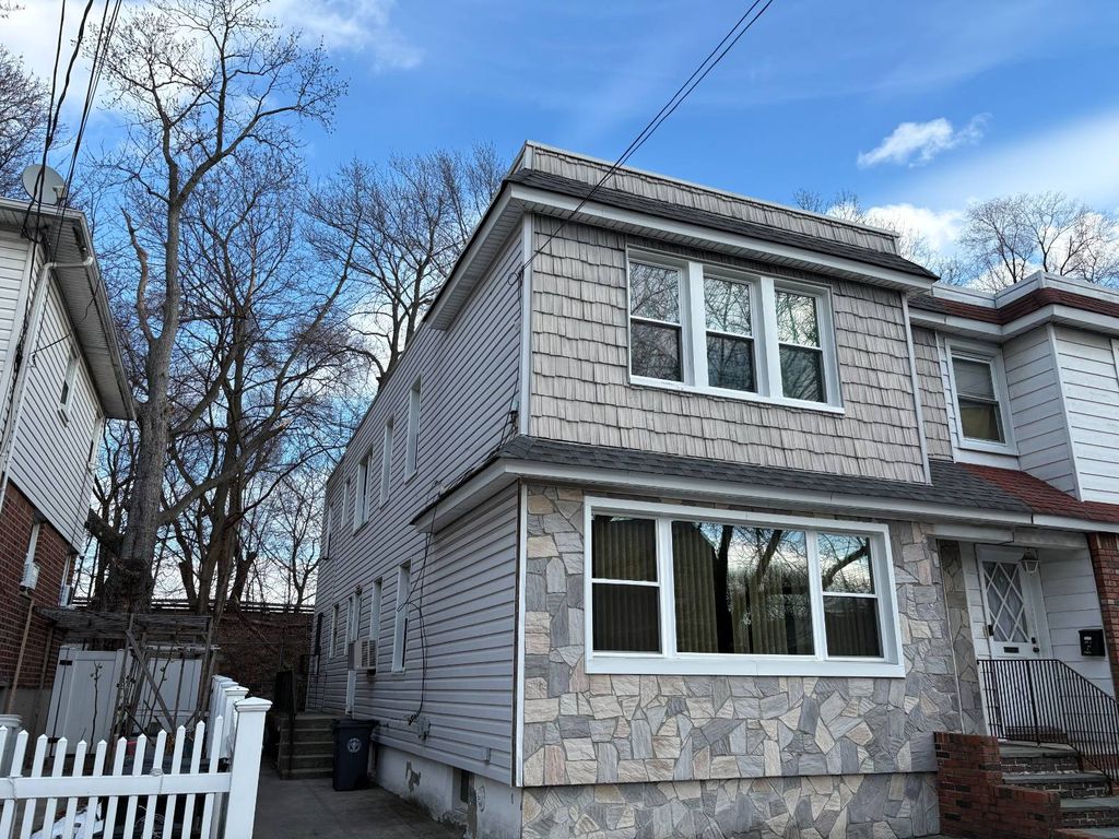 Photo of 13401 Hawtree Street, Ozone Park, NY 11417 (MLS # 11623637)