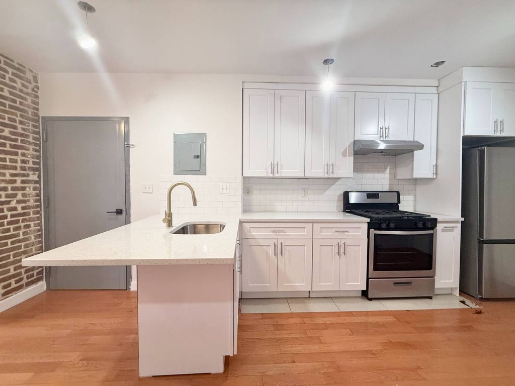 Photo of 296 Eldert Lane, Brooklyn, NY 11208 (MLS # 11680980)
