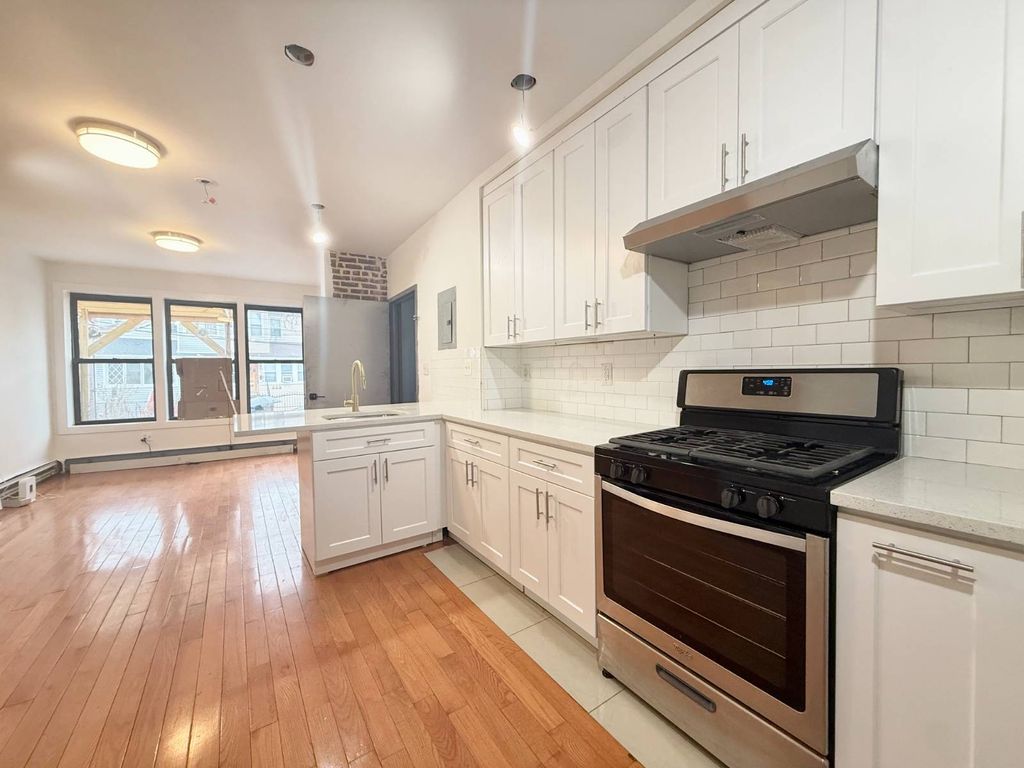 Photo of 296 Eldert Lane, Brooklyn, NY 11208 (MLS # 11680980)