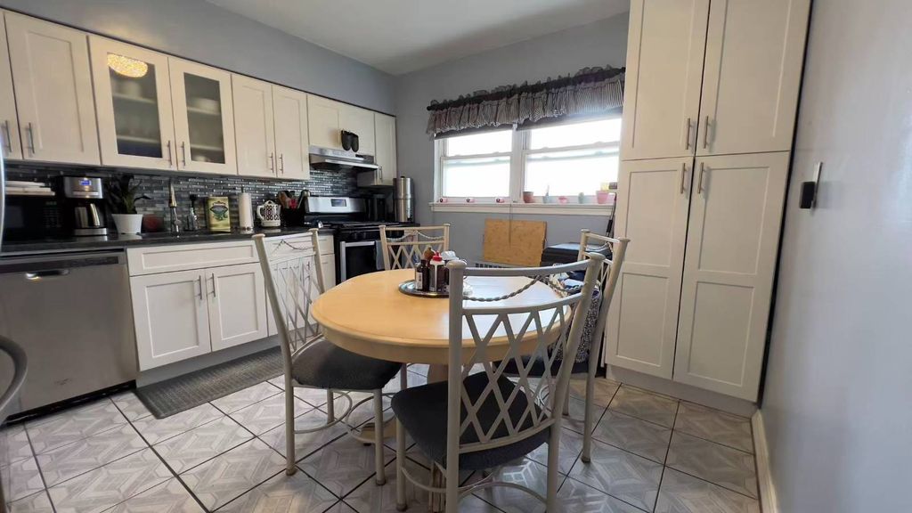 Photo of 5649 Utopia Parkway, Fresh Meadows, NY 11365 (MLS # 11630184)