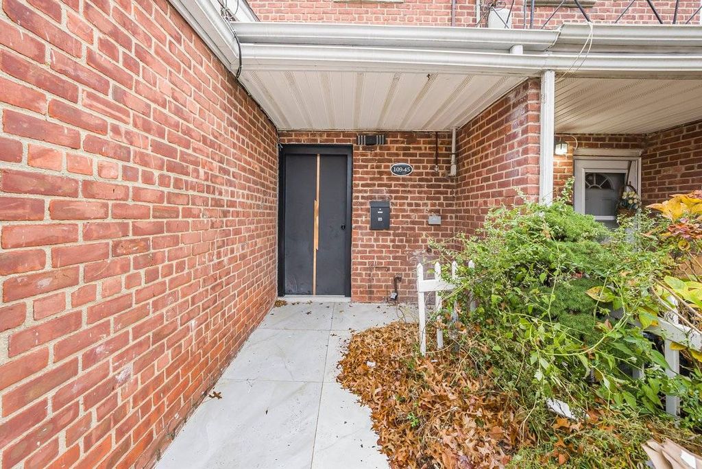 Photo of 10945 173rd St, Jamaica, NY 11433 (MLS # 11612864)