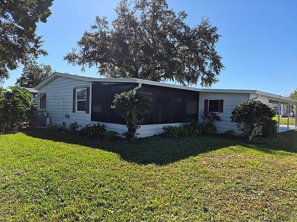 Photo of 2281 Mariposa Ave, Port Orange, FL 32129 (MLS # 11621596)