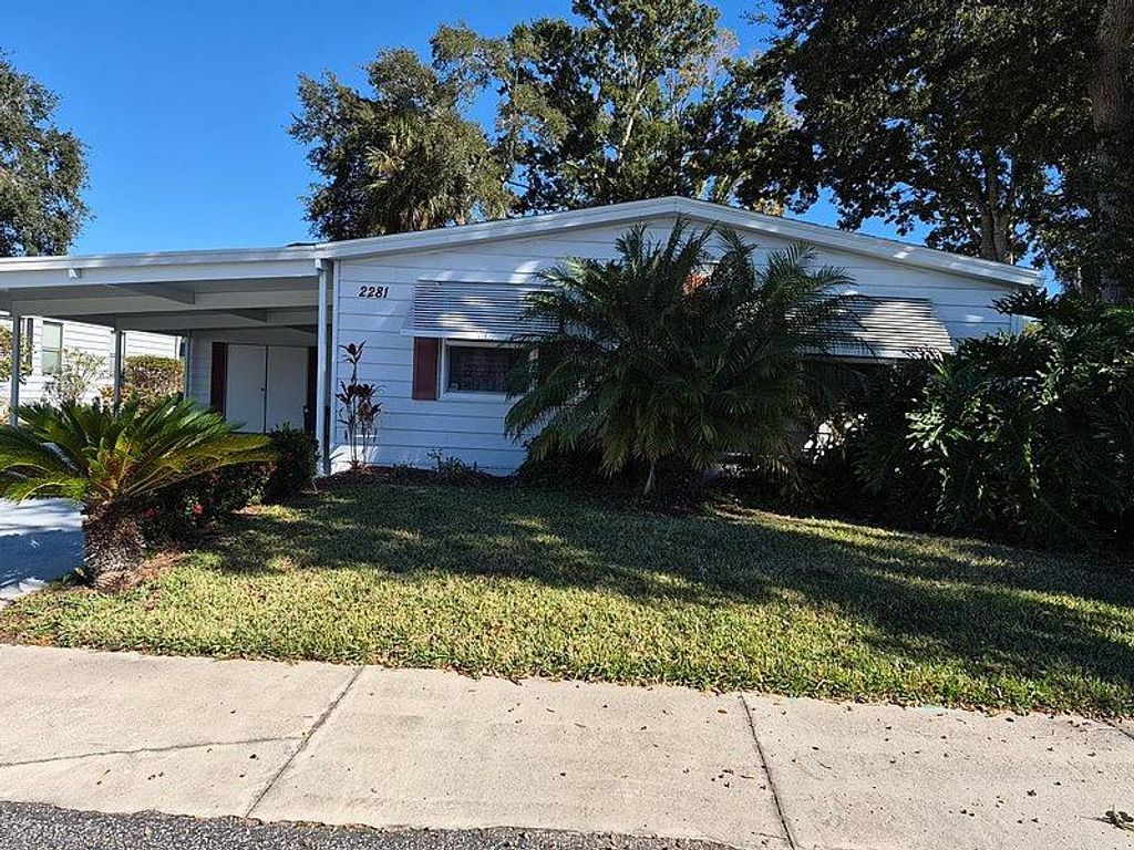 Photo of 2281 Mariposa Ave, Port Orange, FL 32129 (MLS # 11621596)