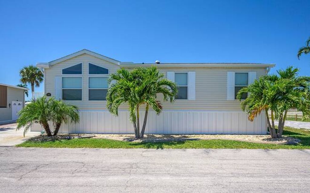 Photo of 599 Sioux Trail, Fort Myers Beach, FL 33931 (MLS # 11651792)