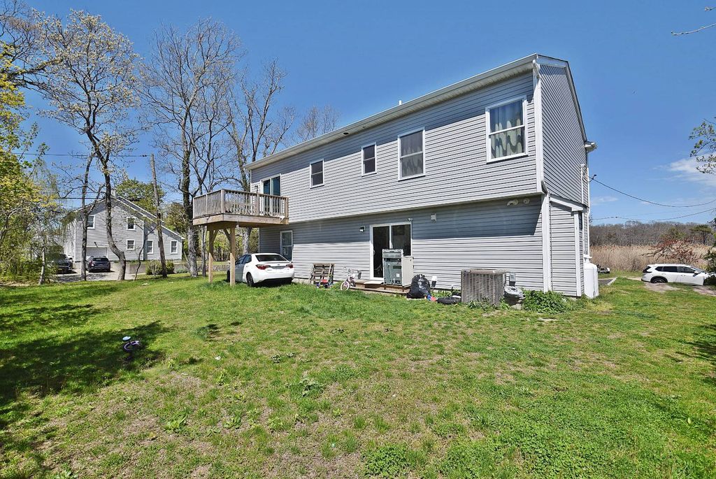 Photo of 64 Park Drive, Mastic Beach, NY 11951 (MLS # 11741729)