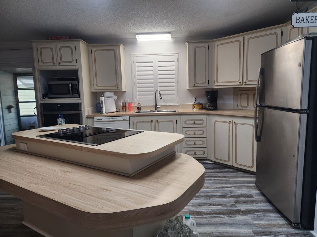 Photo of 6 Sunset Falls Dr, Ormond Beach, FL 32174 (MLS # 11618325)