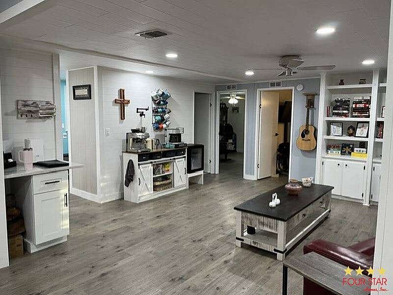 Photo of 2156 Pebble Beach Blvd, Orlando, FL 32826 (MLS # 11920699)