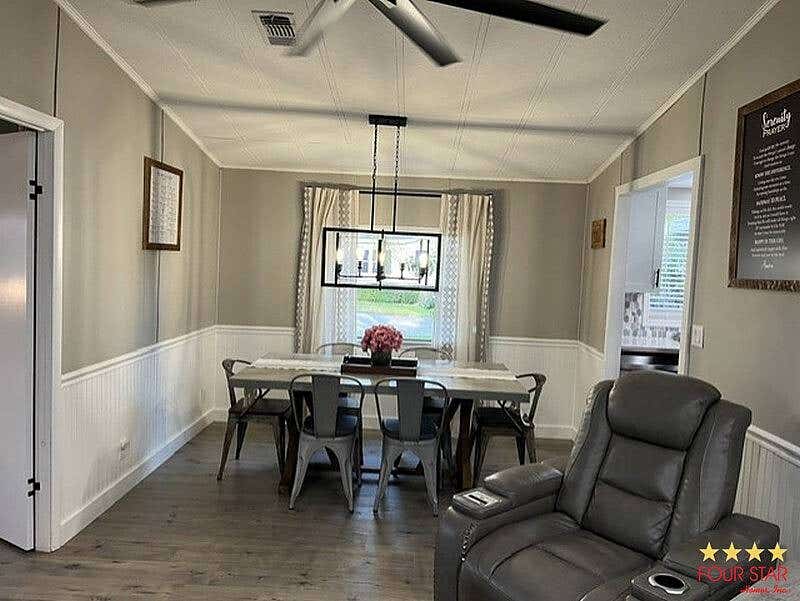 Photo of 2156 Pebble Beach Blvd, Orlando, FL 32826 (MLS # 11920699)
