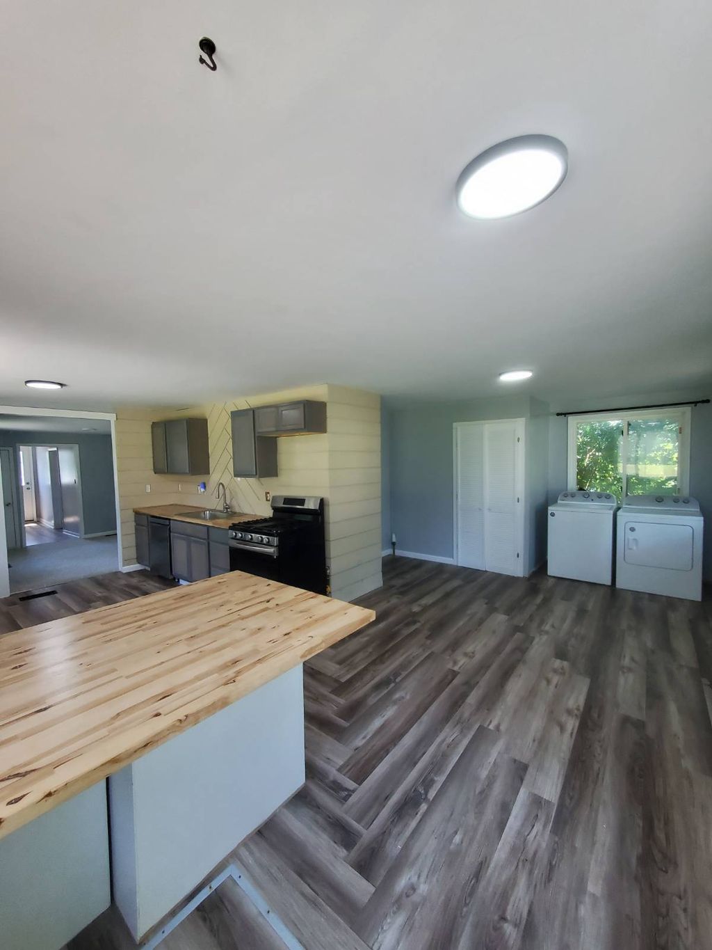 Photo of 61 Burrstone Rd, New York Mills, NY 13417 (MLS # 11858912)