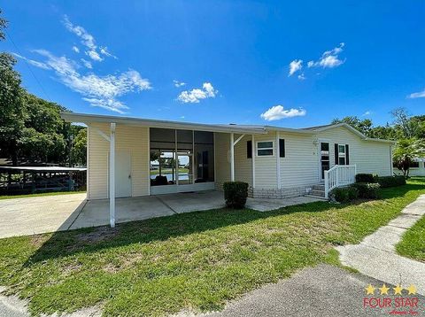 Photo of 34 Harbor Circle, Astatula, FL 34705 (MLS # 11803680)