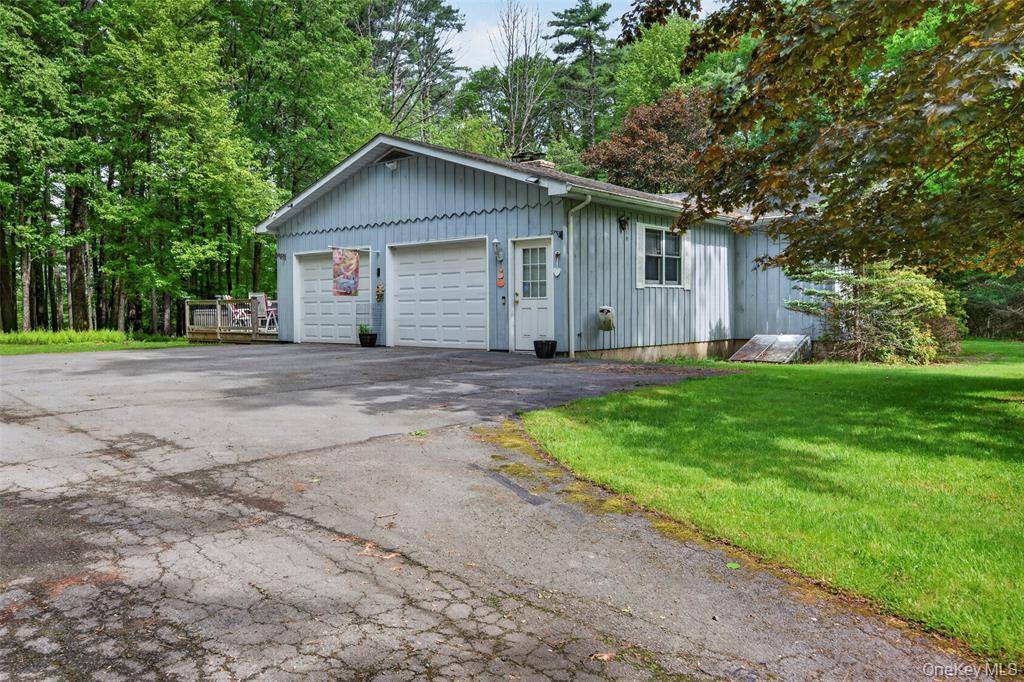 Photo of 11 Fairway Dr, Highland Lake, NY 12743 (MLS # 11924831)