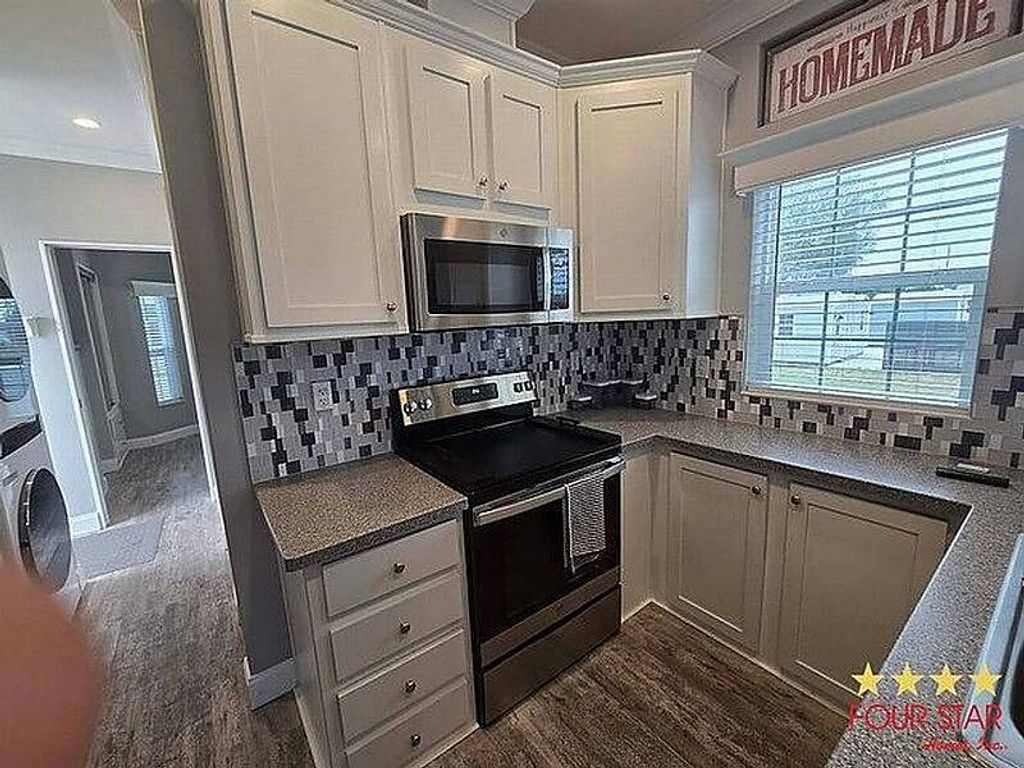 Photo of 609 County Rd 466 #854, Lady Lake, FL 32159 (MLS # 11775925)