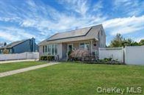 Photo of 100 Anderson Ave, North Babylon, NY 11703 (MLS # 11692397)