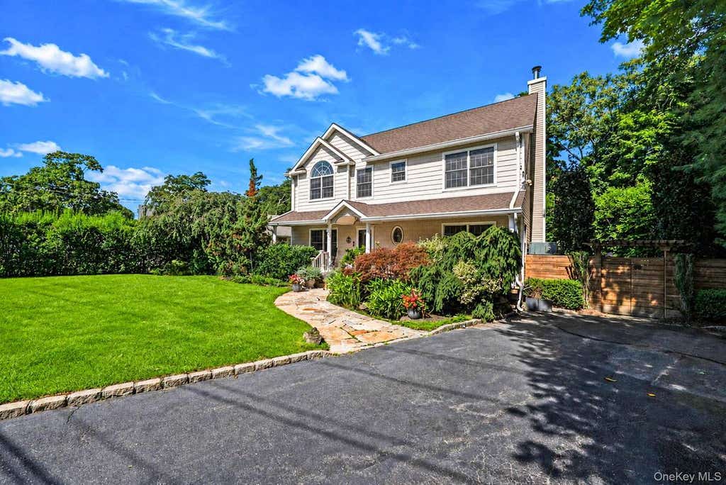 Photo of 91 Traction Boulevard, Patchogue, NY 11772 (MLS # 11924593)